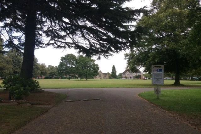 The entrance and green at Highfield Oval in Harpenden